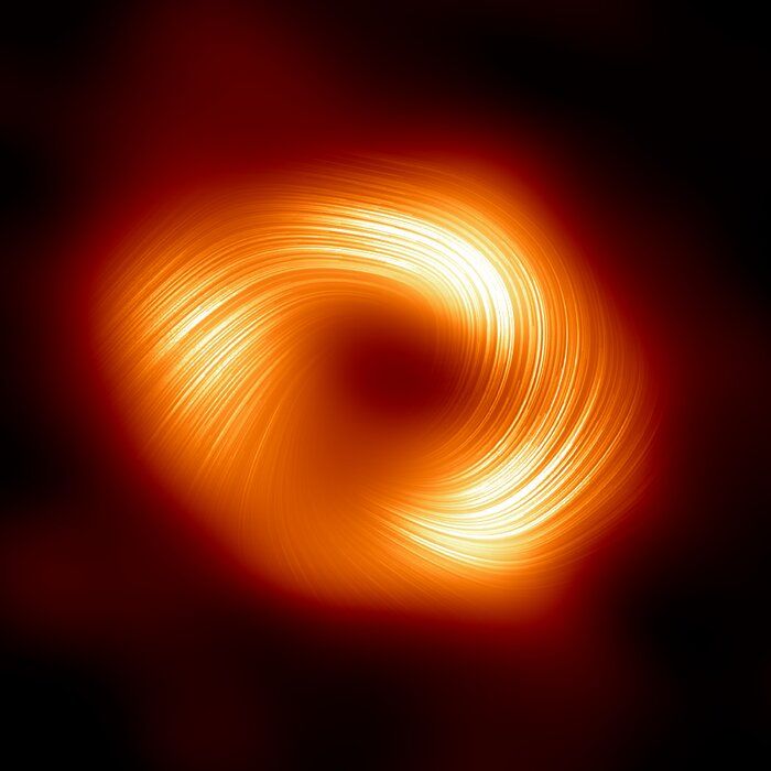Вид на сверхмассивную черную дыру в созвездии Стрельца А* в поляризованном свете. Фото: eso.org