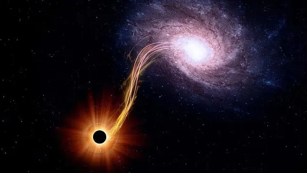 Ученые рассказали, что случится, если человек попадет в черную дыру. Фото: соцсети